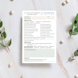 May include: A white session notes form for child and youth workers. The form includes sections for client information, session details, observations, and follow-up notes. The text on the form includes "Emotional Regulation", "Crisis Intervention", and "Peer Interactions".