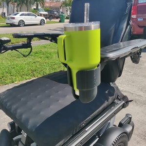 The Universal Drink Holder will hold every kind of wine glass, coffee cup,  cans and bottles. The drink holder is compatible with many various  wheelchairs, power chairs, electric wheelchairs, mobility scooters, and