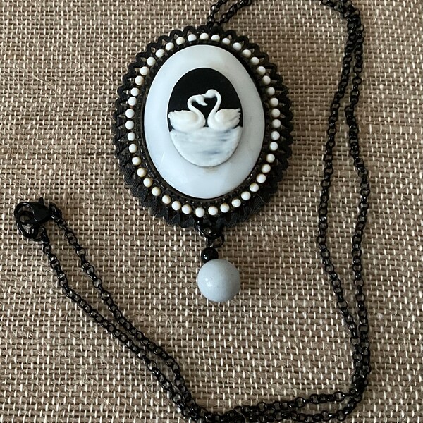 Swan Lake: Black and white swan relief pendant