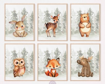 May include: Set of six watercolor illustrations featuring woodland animals in a forest setting. The animals include a rabbit, deer, bear, owl, fox, and moose. Each illustration is framed with a brown border.