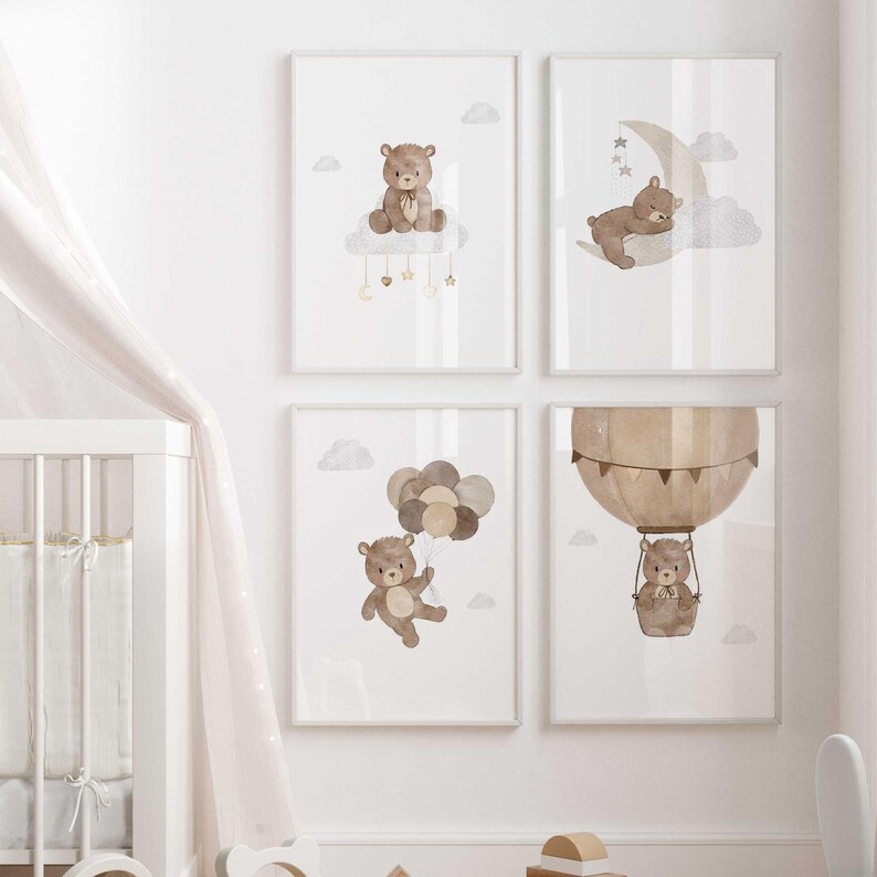 May include: Set of four brown watercolor prints featuring a bear in different scenes. The first print shows a bear sitting on a cloud with stars and hearts. The second print shows a bear sleeping on a crescent moon with clouds. The third print shows a bear holding balloons and flying in the sky. The fourth print shows a bear riding in a hot air balloon.