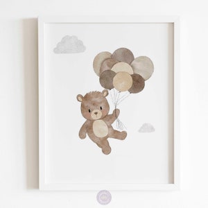 May include: A watercolor illustration of a brown teddy bear holding onto a bunch of brown, beige, and gray balloons. The bear is floating in the air with two small white clouds in the background.