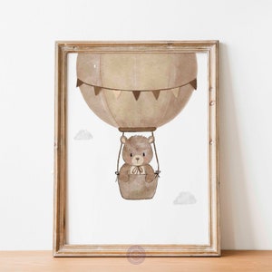 May include: A brown teddy bear in a hot air balloon with white clouds in the background. The balloon is brown with white and brown flags.