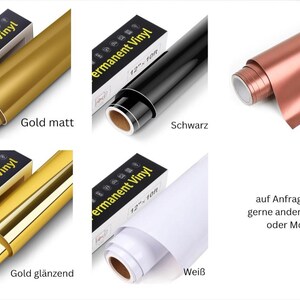 May include: Rolls of permanent vinyl in various colors, including gold, black, rose gold, and white. The image shows both matte and glossy gold vinyl. Each roll is labeled with "Permanent Vinyl" and the size.