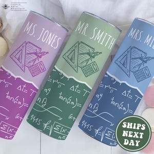 May include: Three stainless steel tumblers with a math-themed design. The tumblers are purple, green, and blue. Each tumbler has a different name on it: "MS. JONES", "MR. SMITH", and "MRS. MILLER".
