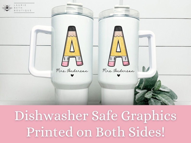 May include: Two white travel mugs with a black pencil design and the text "Mrs. Anderson" on each mug. The mugs are dishwasher safe and have graphics printed on both sides.