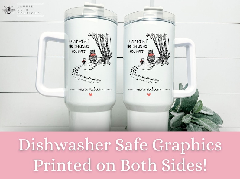 May include: Two white travel mugs with black handles and lids. The mugs have a Winnie the Pooh inspired graphic with the text "Never forget the difference you make." and "mrs. miller" printed on them. Dishwasher safe graphics printed on both sides.