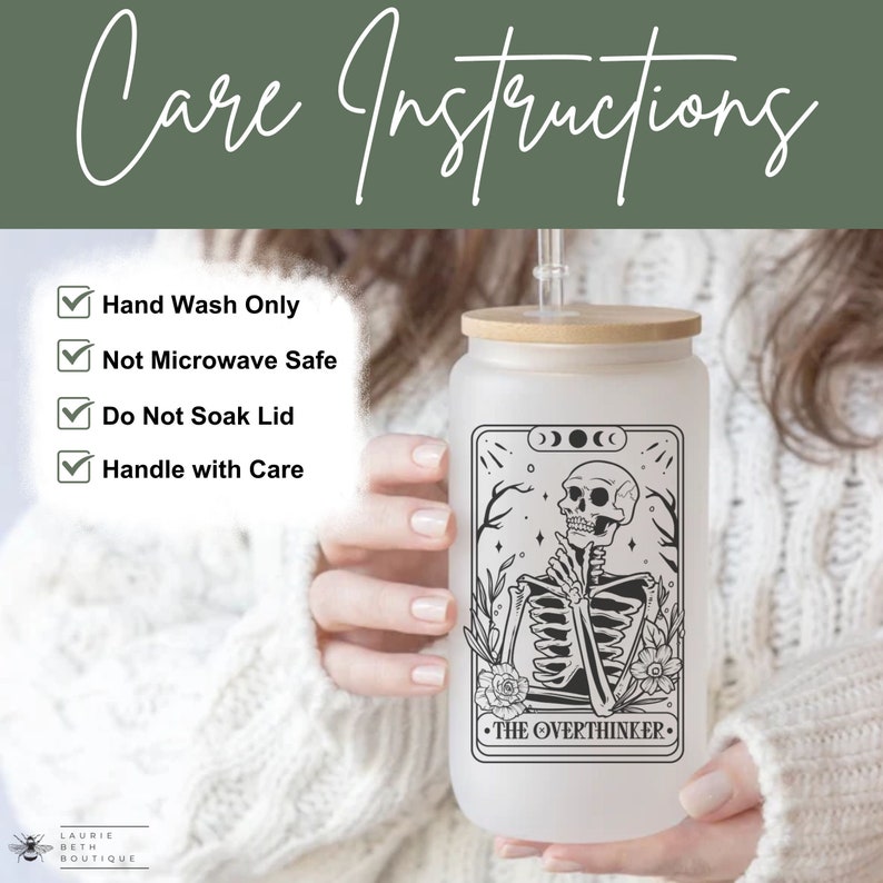 May include: A white frosted glass tumbler with a bamboo lid and a straw. The tumbler has a black and white graphic of a skeleton with the text "THE OVERTHINKER." The tumbler has care instructions: Hand Wash Only, Not Microwave Safe, Do Not Soak Lid, Handle with Care.