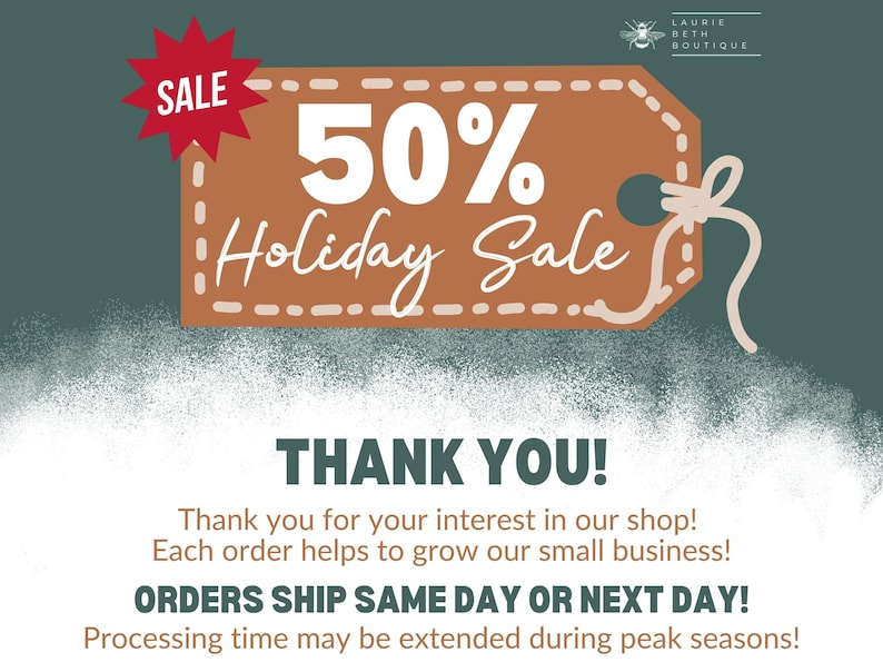 May include: A brown rectangular tag with white dashed borders and a string, featuring the text 50% Holiday Sale in white. A red starburst icon with the word SALE is in the corner. The Laurie Beth Boutique logo with a bee icon is at the top right.