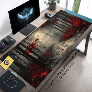 May include: A black and white forest scene with red leaves and a full moon. The text "Available in Many Styles and Sizes to Fit Every Desk" is at the bottom of the image.