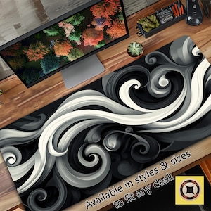 Puede incluir: Alfombrilla de escritorio de diseño abstracto en blanco y negro. La alfombrilla presenta un patrón repetitivo de líneas y formas en espiral. El texto "Disponible en estilos y tamaños para adaptarse a cualquier escritorio" está impreso en la alfombrilla.