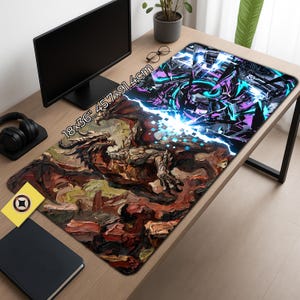 May include: A large rectangular desk mat with a fantasy art design. The mat features a dragon on one side and an abstract geometric design on the other. The mat measures 18x36 inches (45.7x91.4cm).