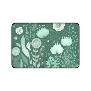 May include: A green background with a pattern of white flowers and leaves. The flowers are stylized and have a whimsical look.