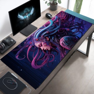 May include: A purple and blue gaming mouse pad with a graphic of a woman with tentacles for hair. The background is a dark blue with a starry pattern.