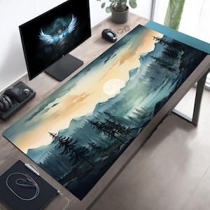 May include: A large, rectangular desk mat with a scenic mountain landscape design. The mat features a blue, green, and yellow color scheme with a large, white moon in the sky. The mat is perfect for adding a touch of nature to your workspace.