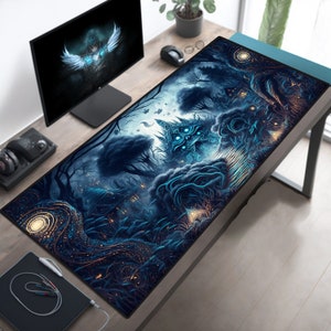 May include: A blue and black gaming mouse pad with a detailed illustration of a skull-like structure in a dark forest setting.