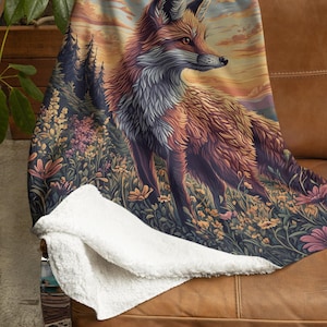 May include: A plush throw blanket with a fox standing in a field of flowers. The fox is facing to the right and has a sunset background.