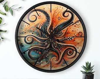 Puede incluir: Un reloj de pared redondo con marco negro, que muestra un diseño abstracto de pulpo. La obra de arte utiliza una paleta vibrante de naranja, azul y negro, con patrones detallados. Las manecillas del reloj son negras.