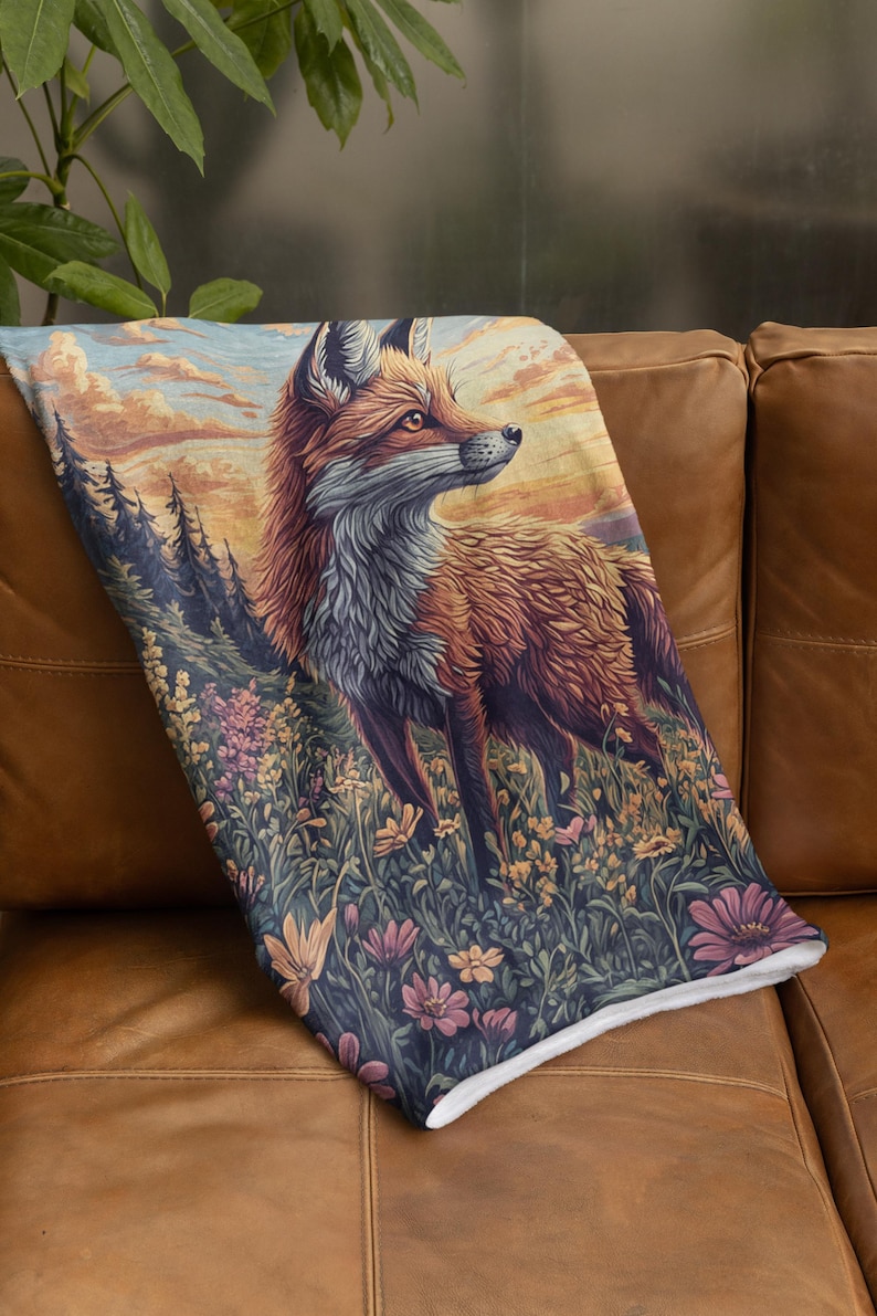 May include: A red fox stands in a field of wildflowers, looking towards a sunset. The fox is surrounded by a variety of flowers, including pink, yellow, and purple.