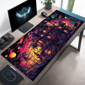 May include: A large, colorful mousepad with a dark, gothic design. The design features a large, detailed building with a skull on top, surrounded by vines and other spooky elements. The colors are vibrant and include shades of purple, blue, green, and yellow.