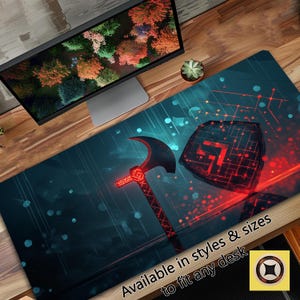 May include: A blue and red gaming mouse pad with a futuristic design featuring a shield and an axe. The text "Available in styles & sizes to fit any desk" is at the bottom of the mouse pad.