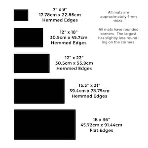 May include: Five different sizes of black mats with hemmed edges, except for the largest mat which has flat edges. The mats are available in sizes ranging from 7 inches by 9 inches to 18 inches by 36 inches. All mats are approximately 4 mm thick and have rounded corners.