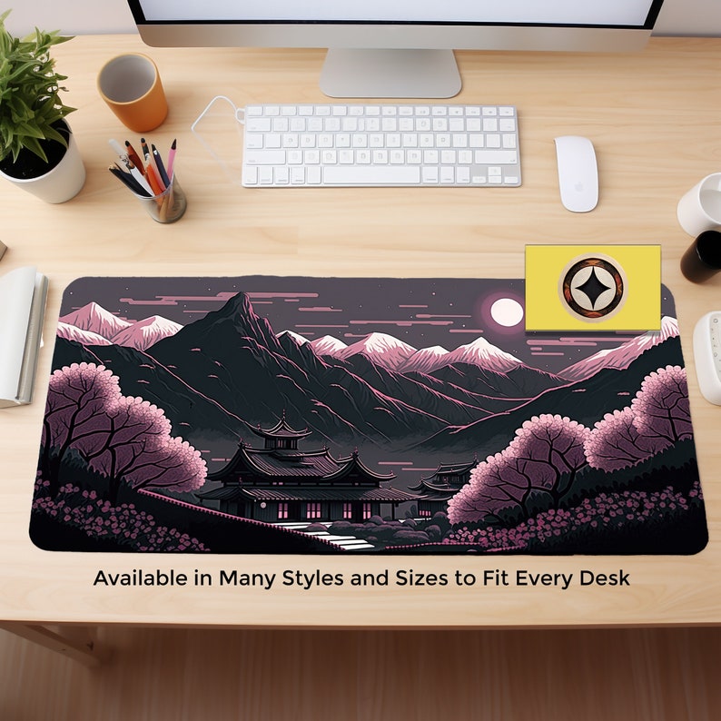 May include: A black and white illustration of a Japanese mountain scene with a temple in the foreground. The scene is set at night with a full moon and pink cherry blossoms. The text "Available in Many Styles and Sizes to Fit Every Desk" is at the bottom of the image.