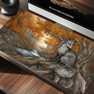 May include: A gray fox with a bushy tail sits on a tree branch in a forest setting. The forest is filled with autumn leaves in shades of orange, yellow, and brown. The fox is looking to the left of the image.