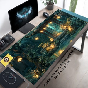 May include: A dark green and blue desk mat with a mystical forest scene featuring a glowing doorway, trees, and lanterns. The text "Available in Many Styles and Sizes to Fit Every Desk" is at the bottom of the mat.