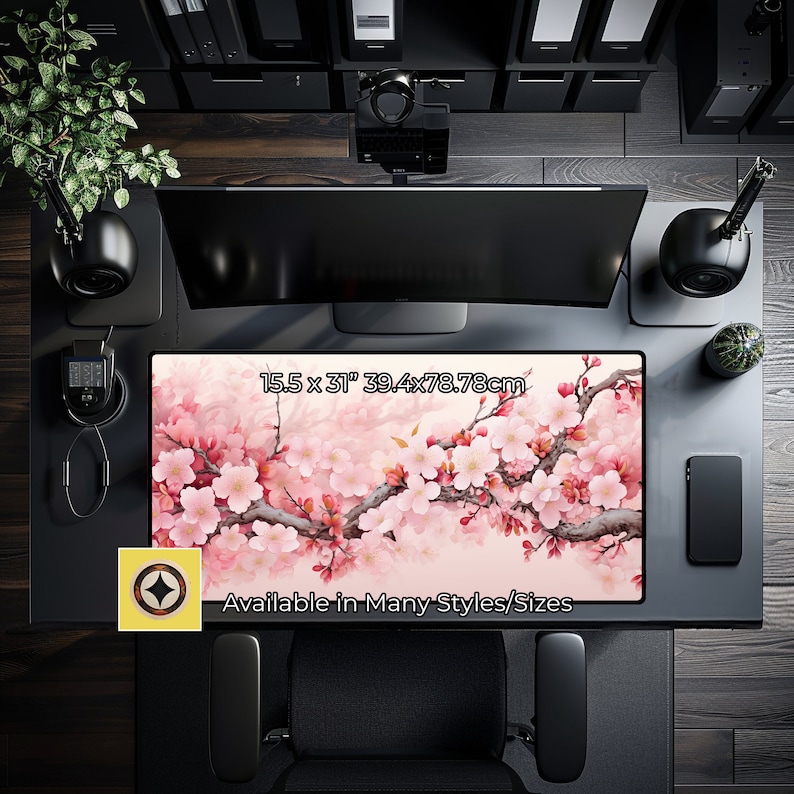 May include: Pink and white cherry blossom floral design desk mat with the text "15.5 x 31" 39.4x78.78cm" and "Available in Many Styles/Sizes".