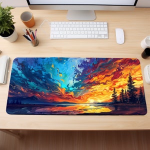 May include: A colorful abstract sunset scene with a lake and trees in the foreground. The sky is a mix of blue, orange, yellow, and red with swirling clouds. The image is perfect for a desk mat or mouse pad.