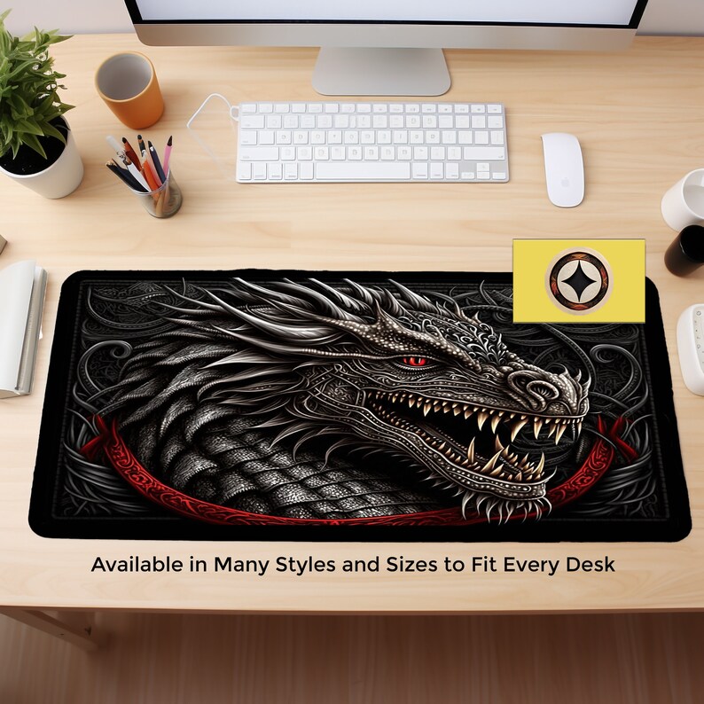 May include: Black and gray dragon head with red eyes and a red ribbon, on a black background with a gray and black intricate design. The text "Available in Many Styles and Sizes to Fit Every Desk" is at the bottom of the image.