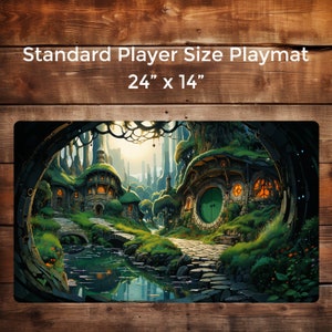 May include: A green, brown, and gray playmat with a fantasy scene of a village with stone houses and a river. The playmat is 24 inches by 14 inches.