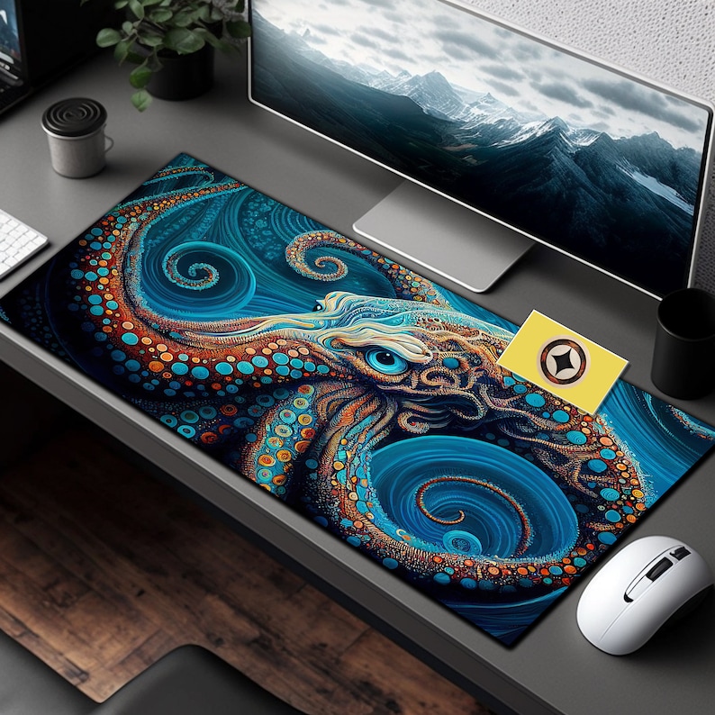 May include: A blue and orange octopus with swirling patterns on a blue background. The octopus is a detailed illustration on a mouse pad.