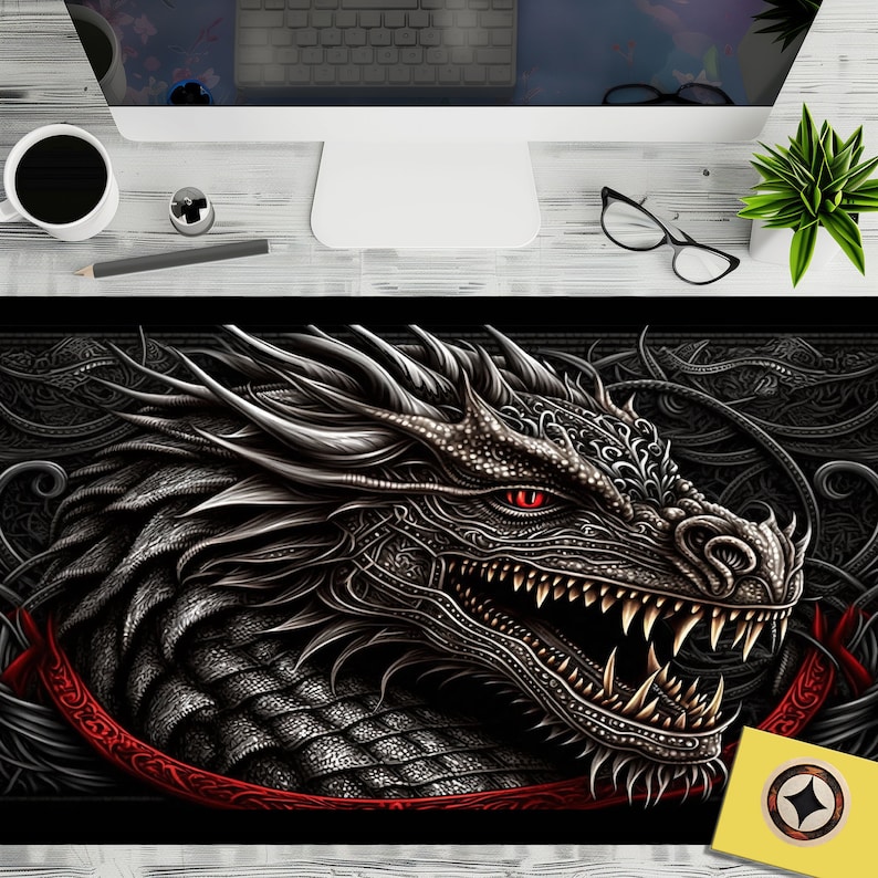 May include: A black and silver dragon head with red eyes, detailed with intricate patterns, against a dark background with a red ribbon.