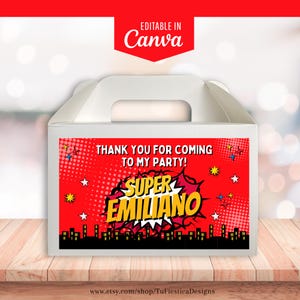 May include: White party favor box with a red comic book style design. The design includes the text "THANK YOU FOR COMING TO MY PARTY!" and "SUPER EMILIANO" in yellow and white. The box has a handle.