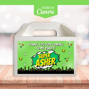 Może przedstawiać: Białe pudełko na upominki z zielono-białym wzorem w stylu komiksowym. Projekt zawiera tekst "THANK YOU FOR COMING TO MY PARTY!" i "SUPER ASHER". Pudełko ma uchwyt i sylwetkę miasta.