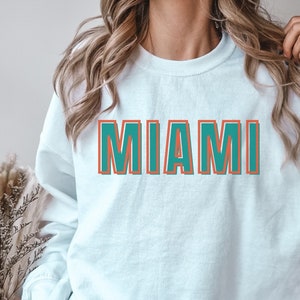 Sudadera vintage de los Miami Dolphins: cuello redondo del equipo de fútbol americano de la NFL