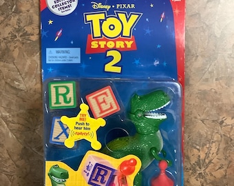 Unopened 1999 Silver Edition Disney Pixar TOY STORY 2 "Wreck-A-Saurus REX" Action Figure