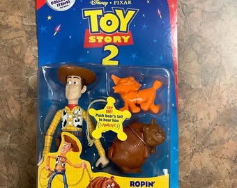 Unopened 1999 Silver Edition Disney Pixar TOY STORY 2 "Ropin' Rescue WOODY" Action Figure