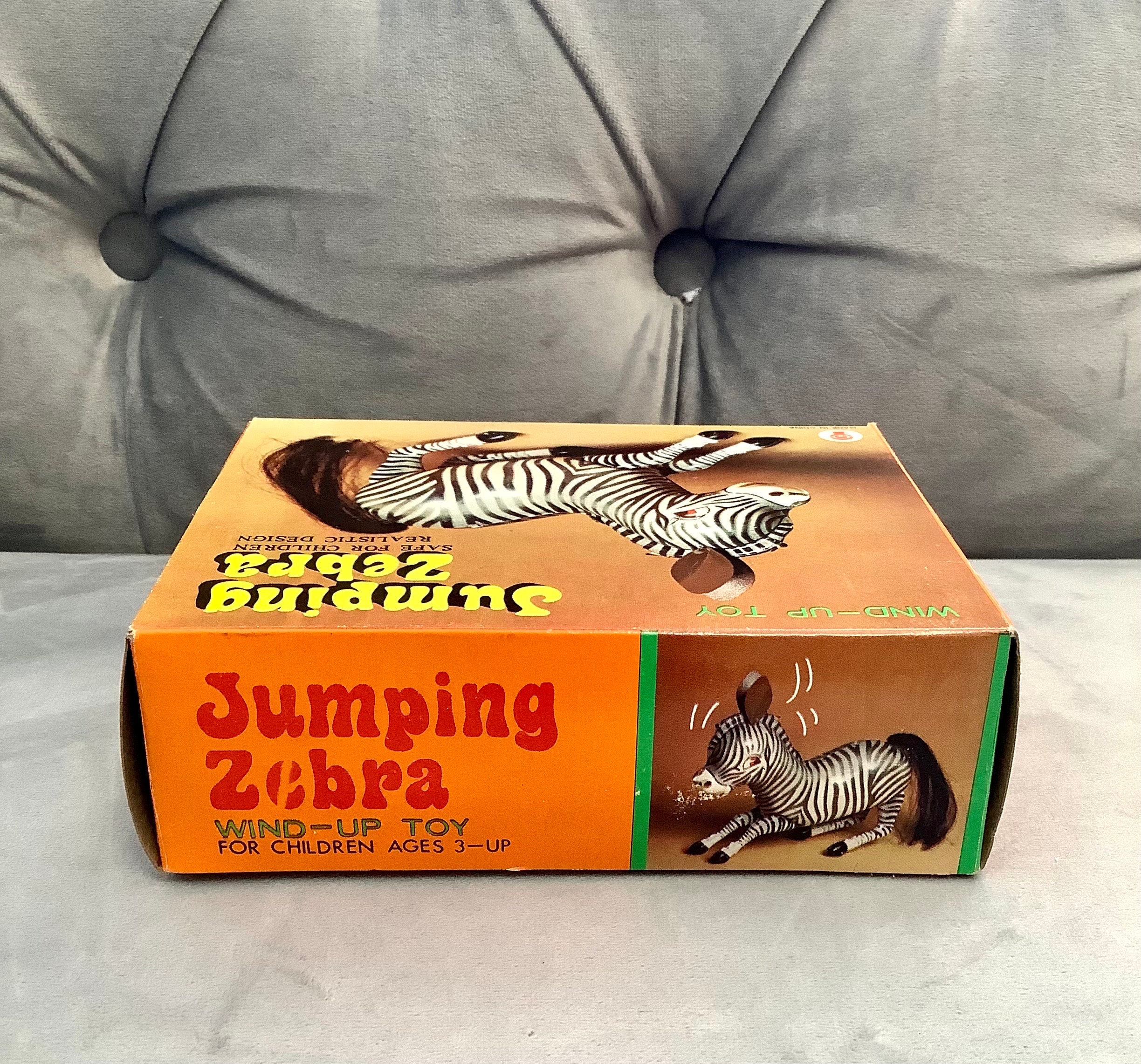 Vintage 1970s Metal Clockwork Jumping Zebra Wind-up Toy With