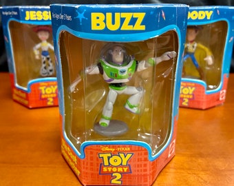 Unopened 1999 Set of Four TOY STORY 2 Die Cast Characters Unopened 1999 Set of Four TOY STORY 2 Die Cast Characters