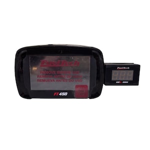 May include: A black FuelTech FT 450 digital display unit with a smaller, attached digital gauge. The display reads "REMOVE BEFORE USE" in English and Spanish. The gauge displays "FuelTech" and a three-digit number.