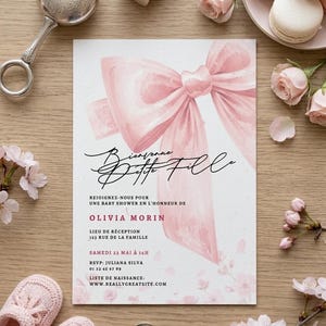 May include: A set of three ceramic mugs with a speckled, matte finish. The mugs are in shades of cream, light gray, and dark gray. Each mug has a simple, minimalist design and a rounded handle.