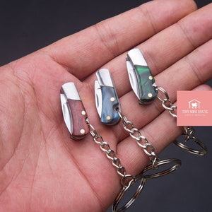 Real Miniature Pocket Folding Knive Can Really Cut And Sharp.