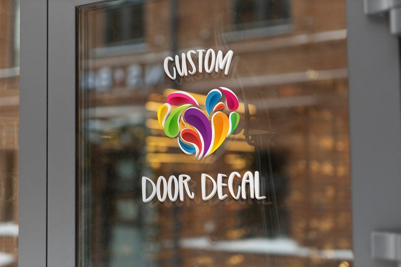 May include: A colorful heart-shaped door decal with the text "CUSTOM DOOR DECAL" in white lettering.