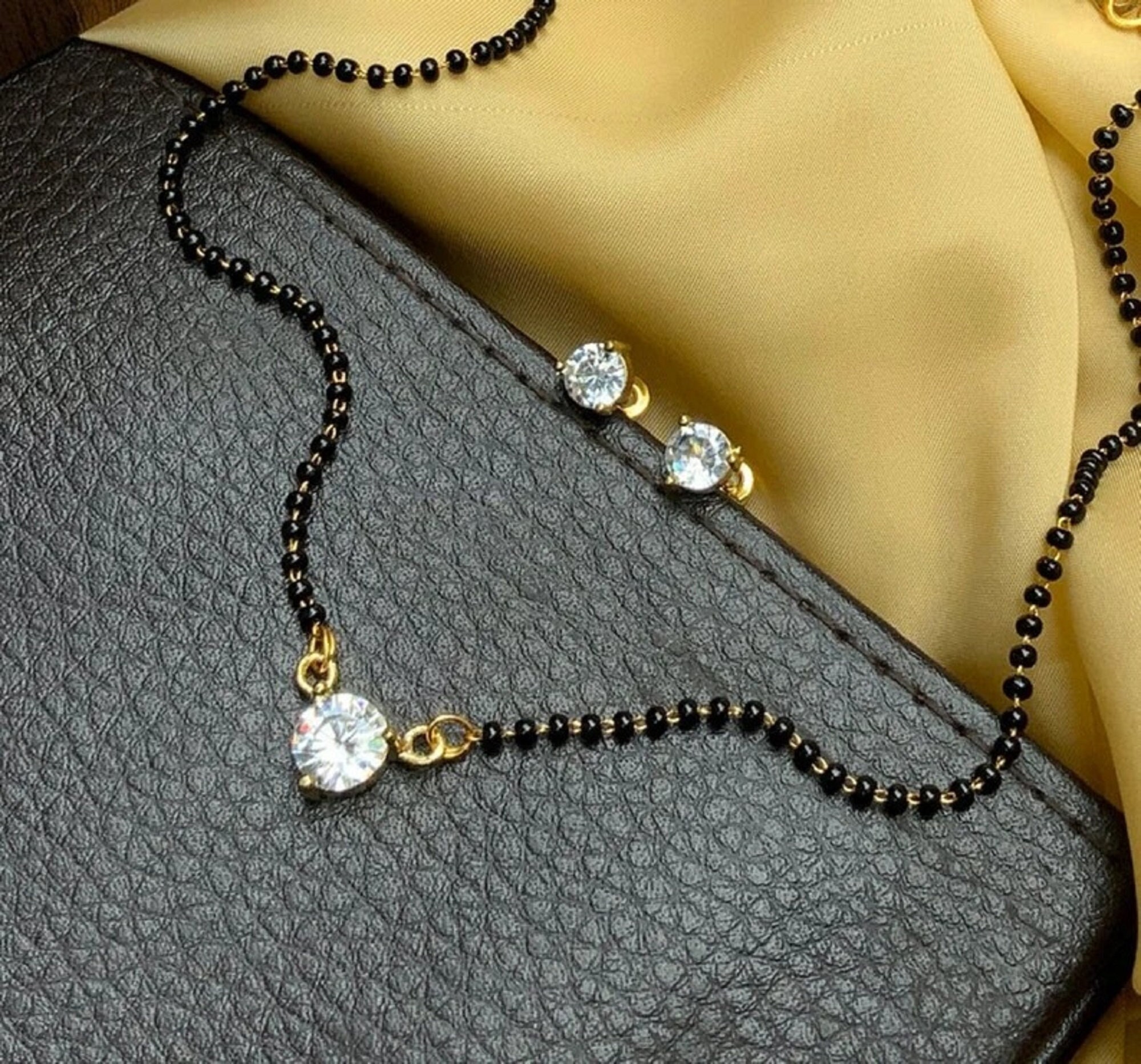 Diamond mangalsutra best sale gold