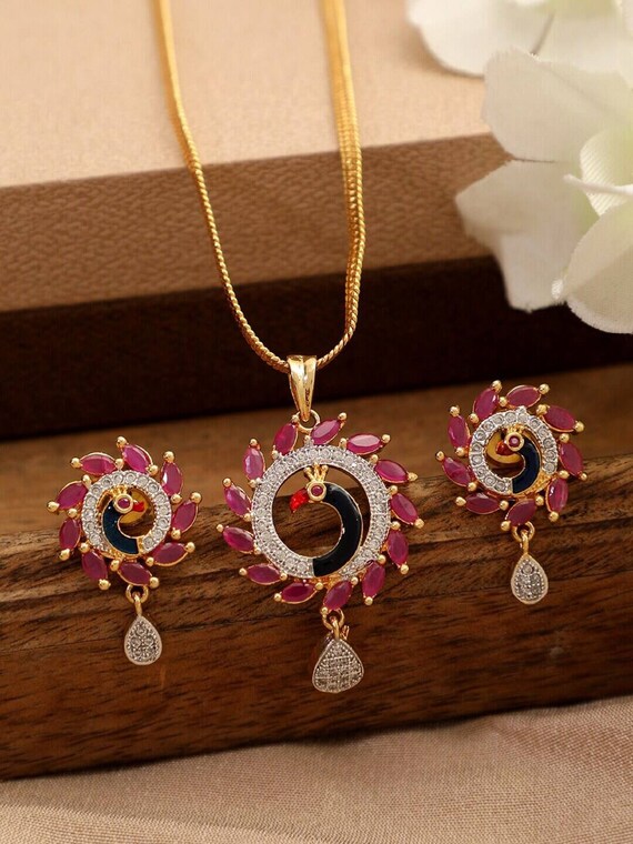Peacock pendant deals necklace gold