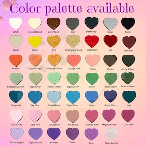 May include: A color palette chart featuring heart-shaped samples in various colors, including white, black, red, and blue. The text "Color palette available" is at the top. Each heart is labeled with its color name.
