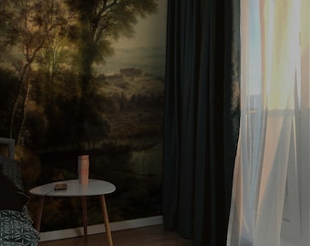 May include: A room with a large painting of a forest scene on the wall. The painting is in shades of brown, green, and blue. There is a small table with a white top and wooden legs in the foreground. The table has a pink thermos on it. There are dark blue curtains on the left side of the image and white sheer curtains on the right side of the image.